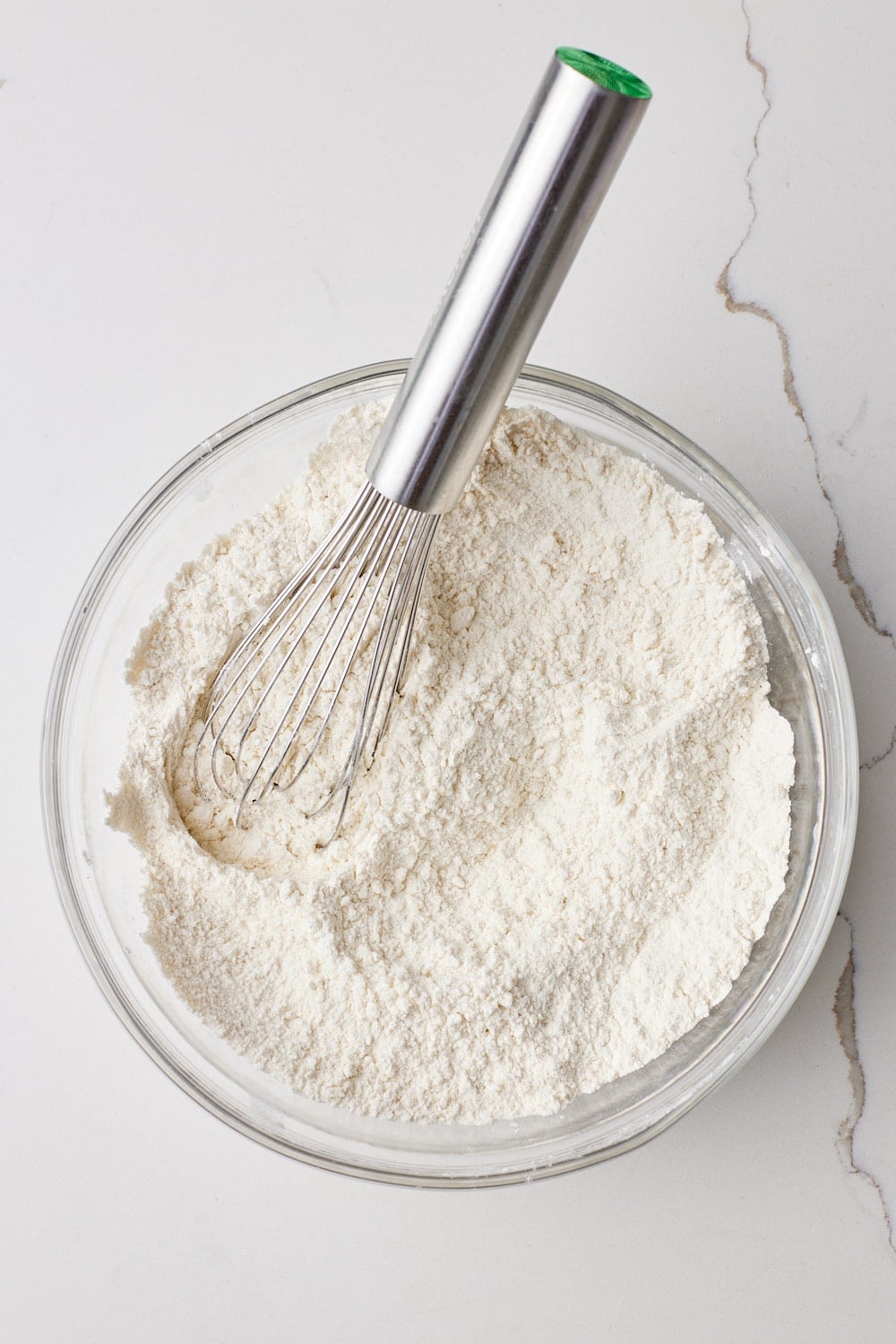 Combine flour and baking soda for chocolate mayonnaise cake. 