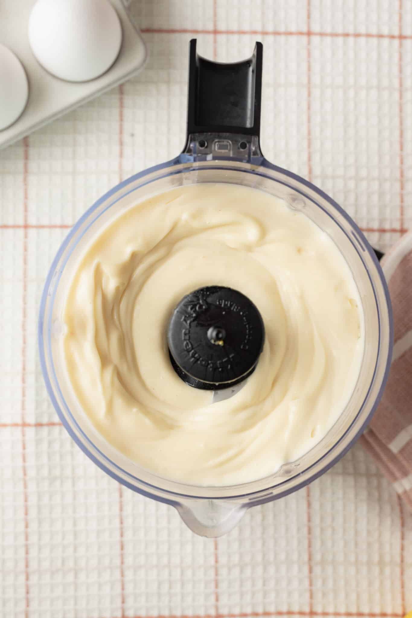 Homemade Mayonnaise3 Top-down view of homemade mayonnaise in food processor.