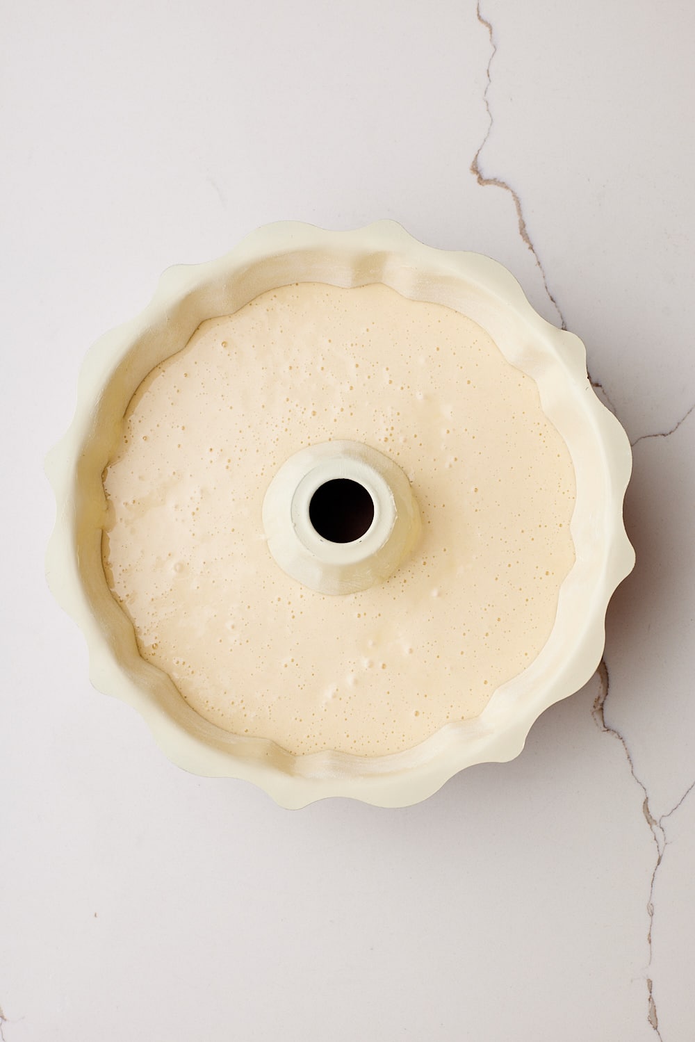 Pour the batter into the prepared pan. 