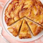 Top-down view of Peach Upside Down Cake, with three slices.