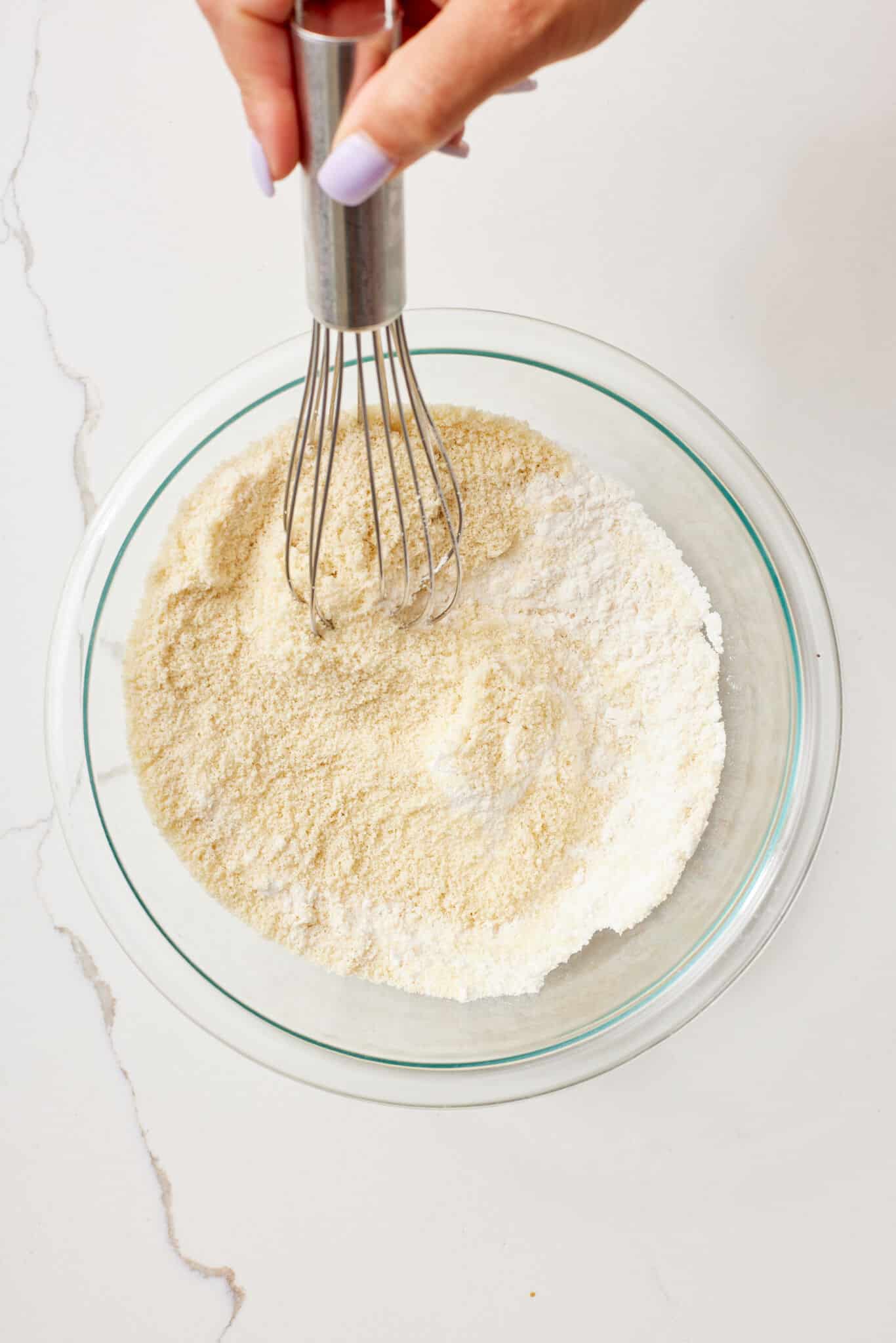 Combine the dry ingredients for Peach Upside Down Cake. 