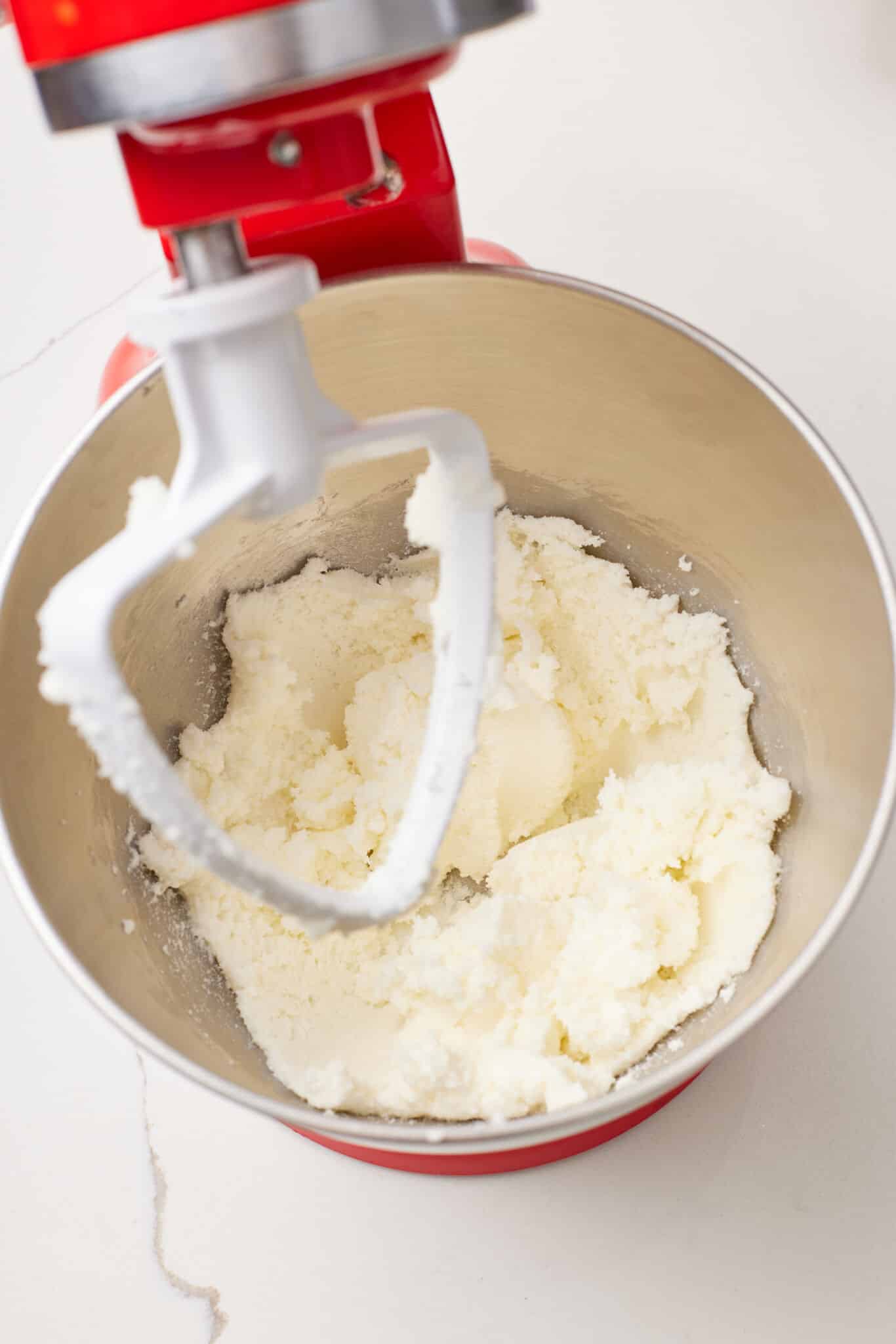 Cream butter, sugar and salt for Peach Upside Down Cake in a stand mixer. 