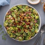 Overhead view of broccoli cranberry salad in a large serving bowl.