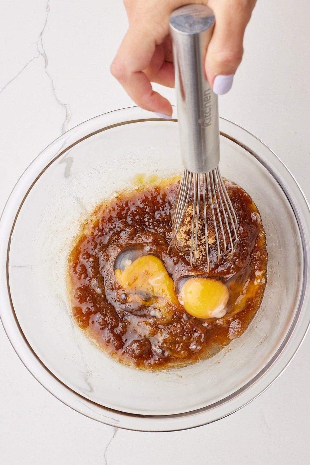 Whisk the eggs, brown sugar, and vanilla extract into the brown butter.
