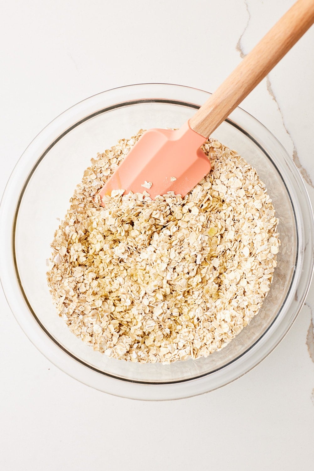 Mix in butter until oats are evenly coated. 