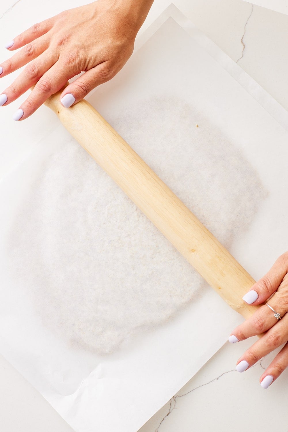 Rolling out Scottish Oat Cakes dough. 