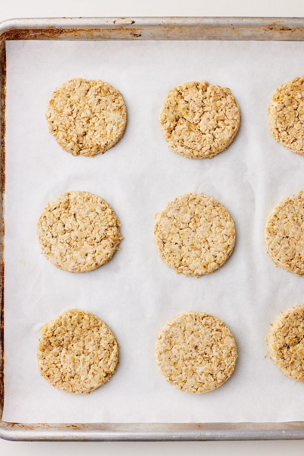 Add cut oatcakes to the sheet.